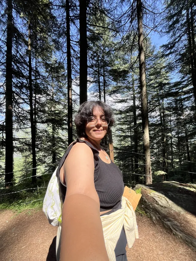 Harshita on the forest trail among the deodars