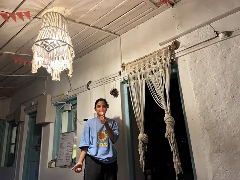 Evening in the verandah under the macramé chandelier